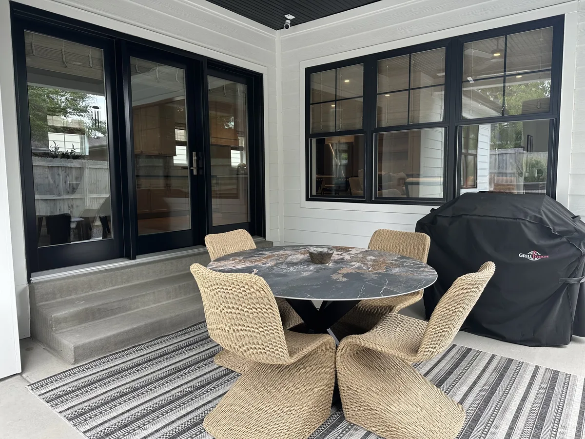 Clean windows overlooking a backyard patio